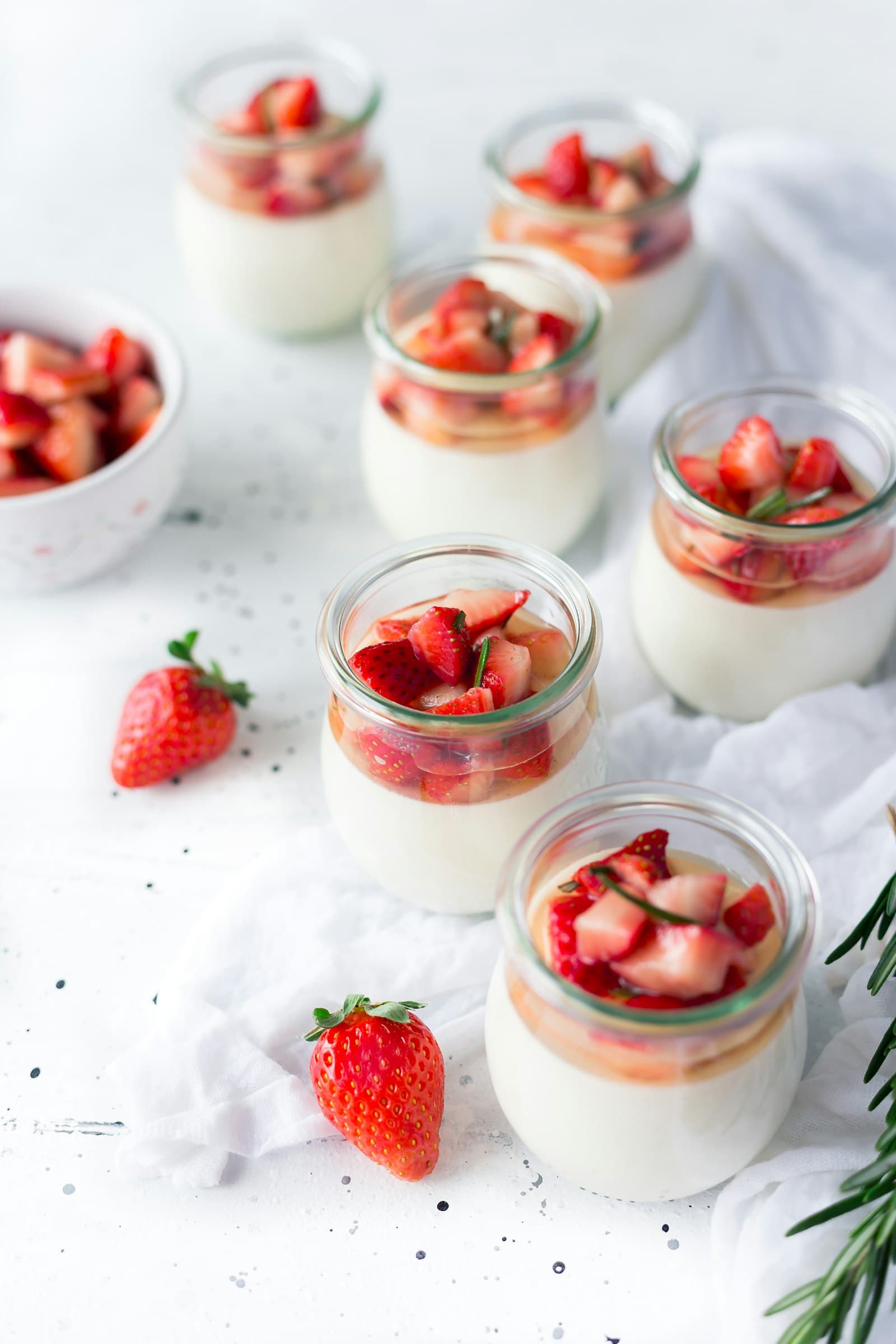 A bowl of Greek yogurt topped with berries and granola